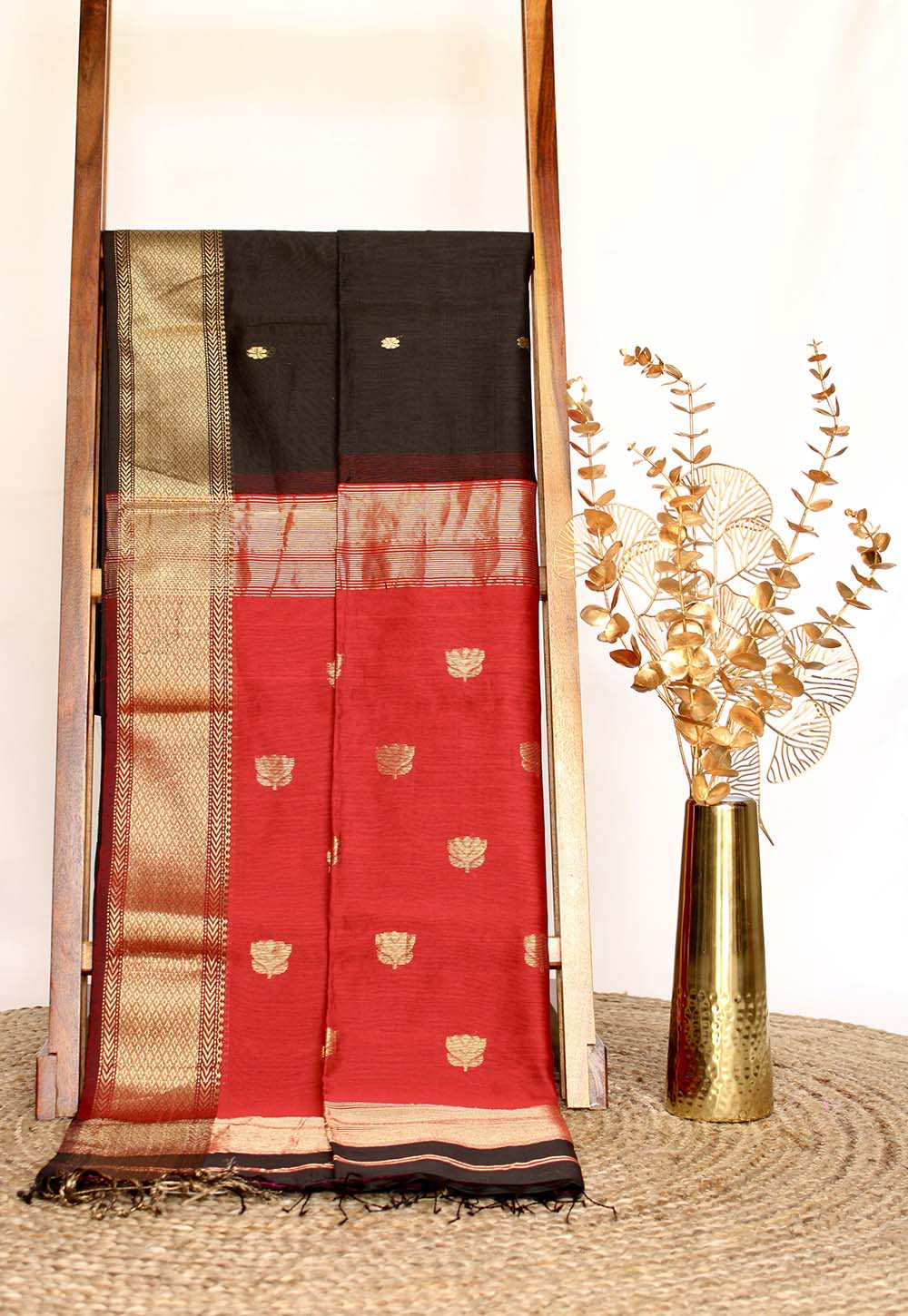 Black Maheshwari Saree with lotus weaving on Red Pallu
