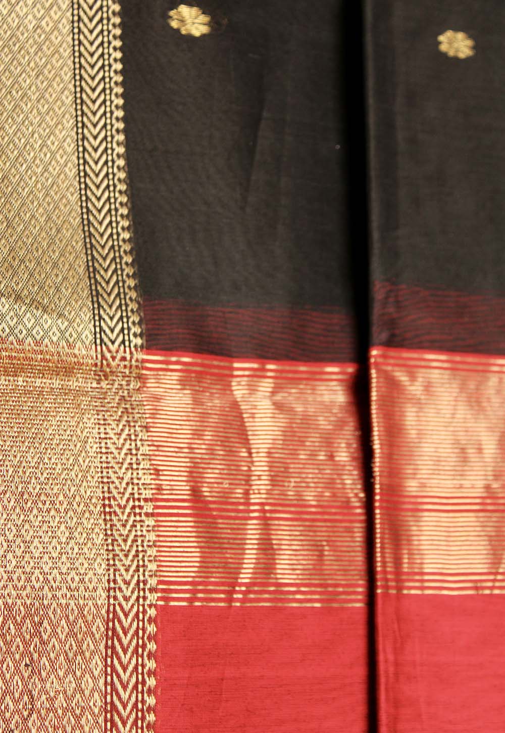 Black Maheshwari Saree with lotus weaving on Red Pallu